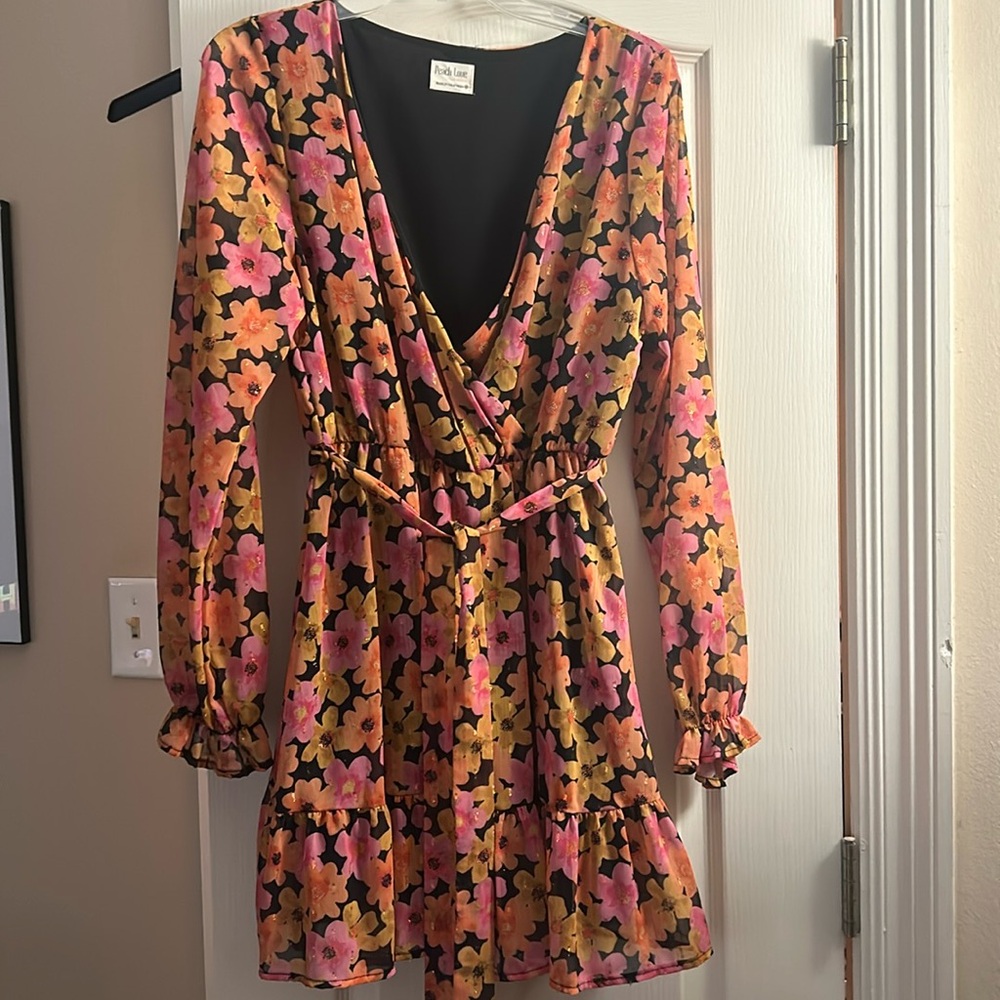 Boutique size medium, floral long sleeve, mini dress